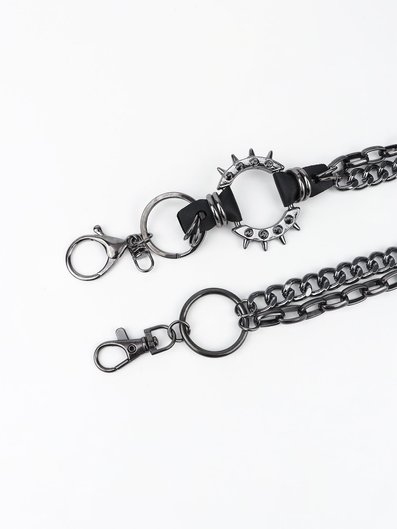 Two aluminium double chain link wallet chains with lobster clasps and metal ring attachments on white background