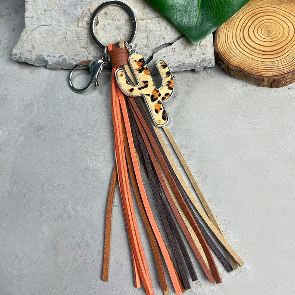 Cactus keychain with leopard print alloy charm and multicolor cowhide tassels, 8.7 inches long accessory.