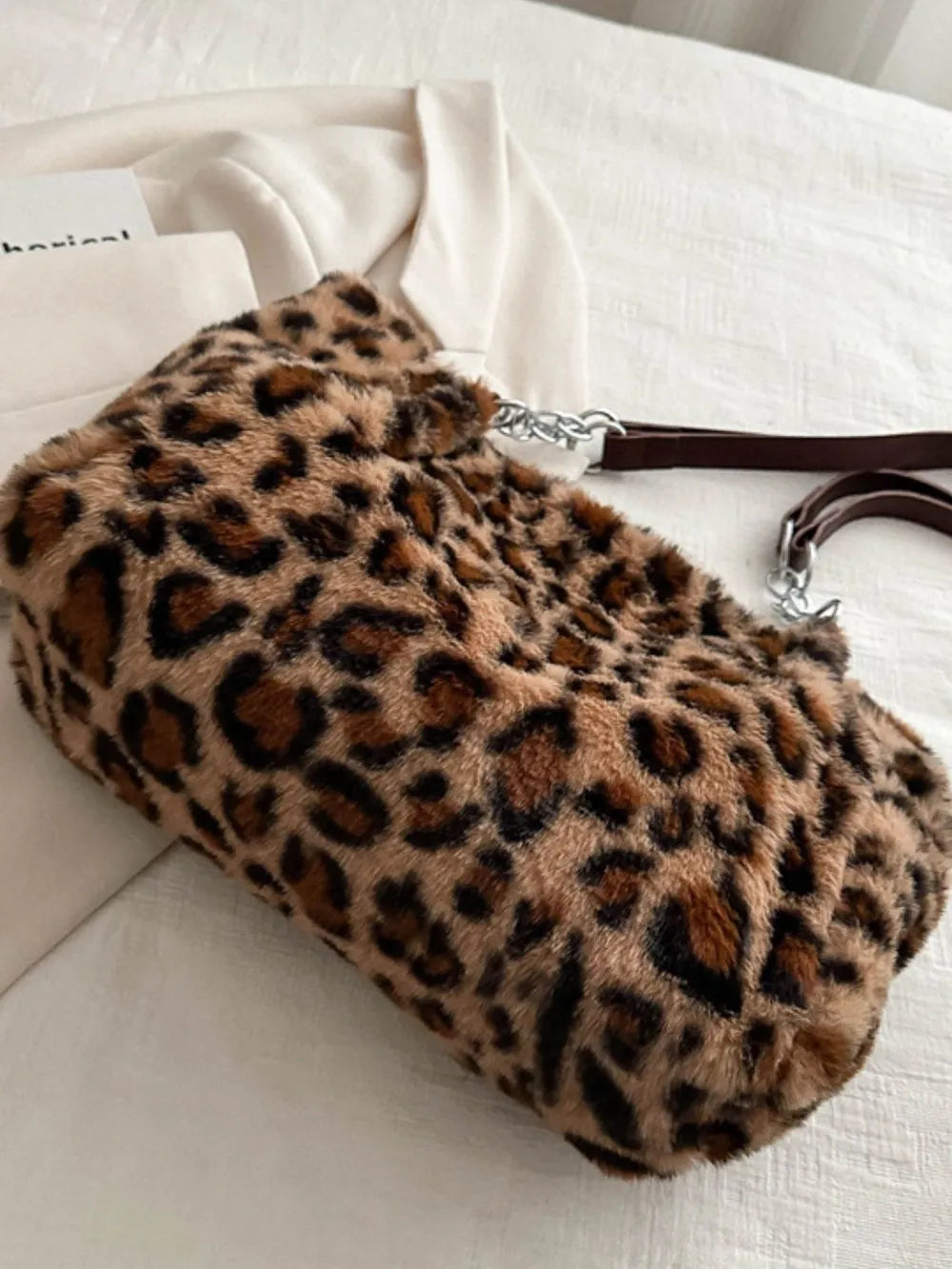 Large leopard print shoulder bag made of soft faux fur with a durable polyester strap for stylish everyday use