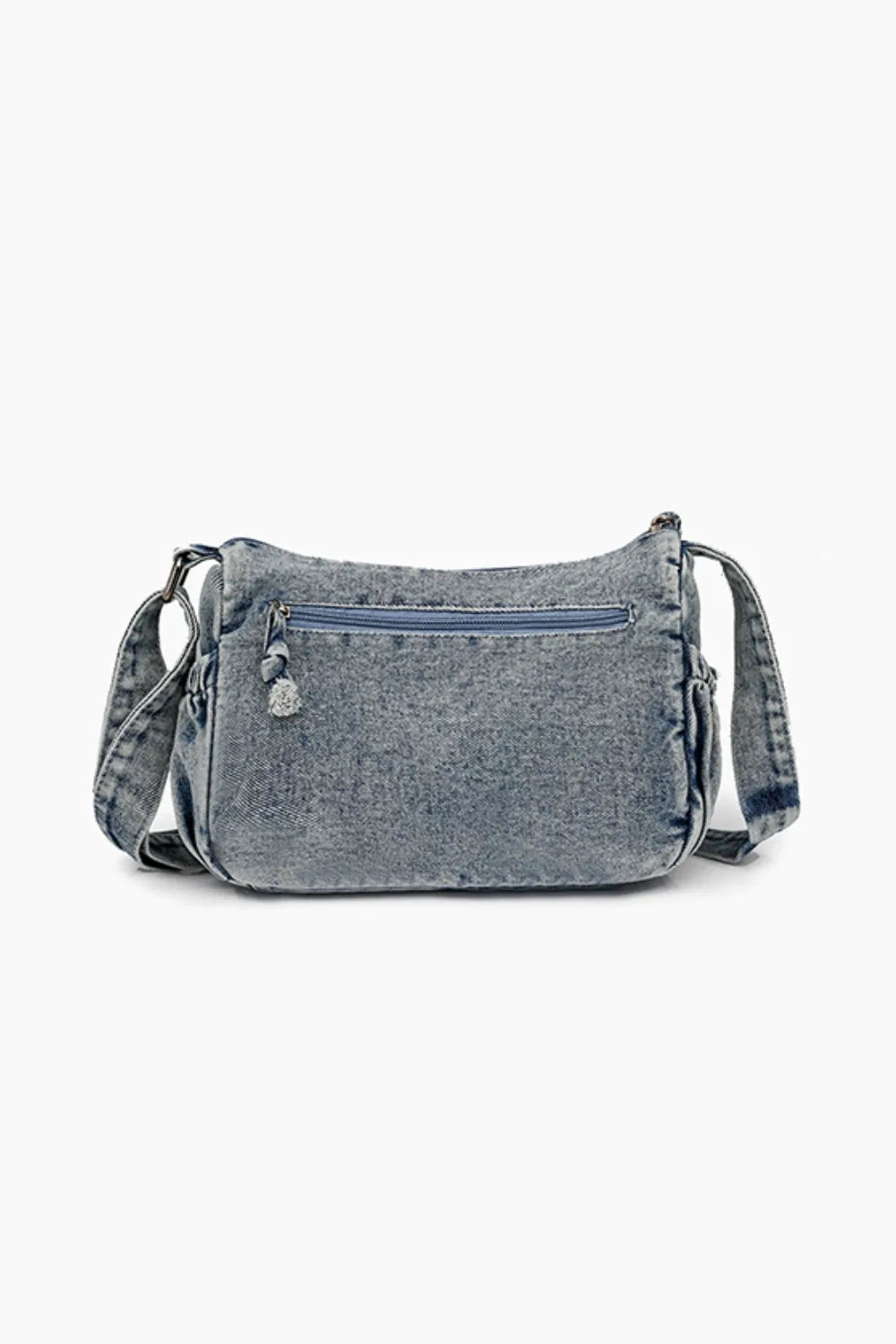 Medium-sized denim crossbody bag with adjustable strap and front zipper pocket for everyday use