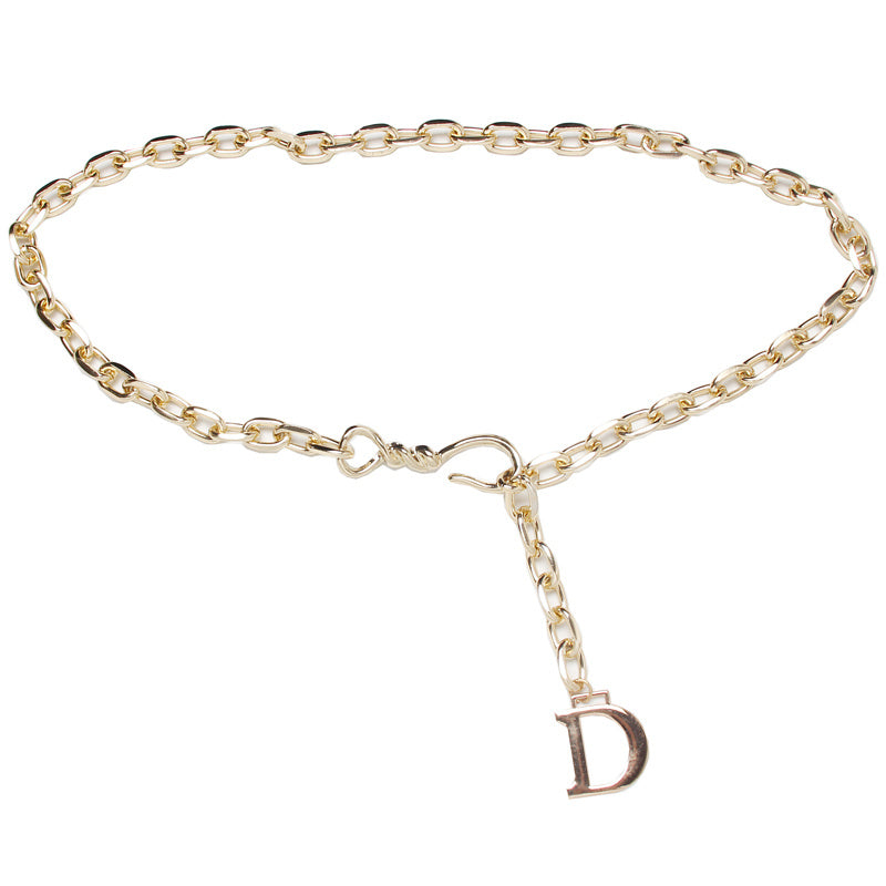 Gold chain belt with a 'D' logo on a white background
