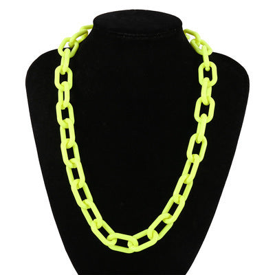 Chunky neon green acrylic link chain necklace on display, perfect for women's punk style fashion.
