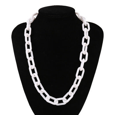 White chunky acrylic link chain necklace on a black display stand, stylish punk resin jewelry for women.