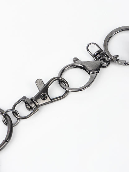 Close-up of a black aluminium double chain link wallet chain with clasp and keyring on white background