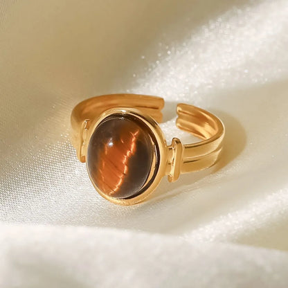	Adjustable gold ring with small brown gemstone – dainty jewelry for women