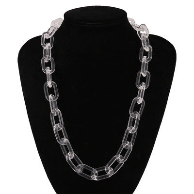 Stylish women's chunky acrylic link chain necklace in transparent color, showcasing a modern punk resin design.